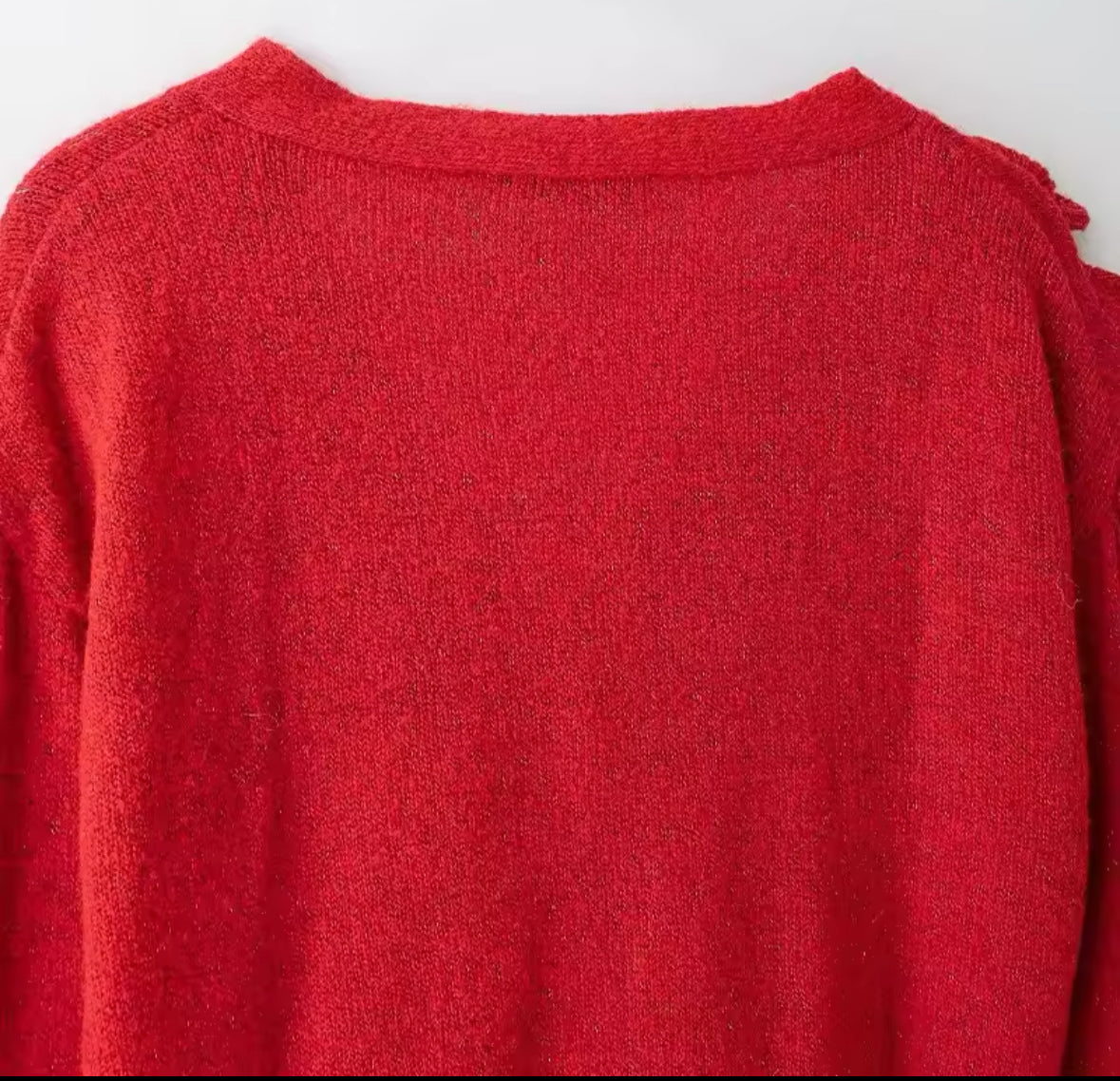 Suéter de punto rojo