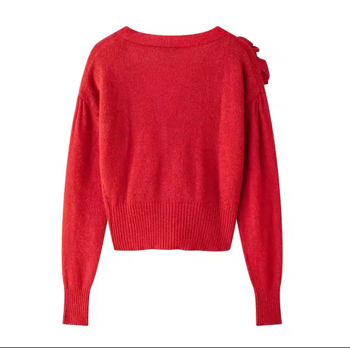 Suéter de punto rojo